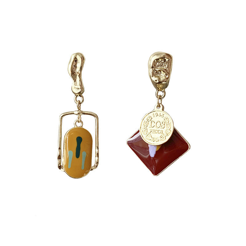Vintage metal asymmetric earrings