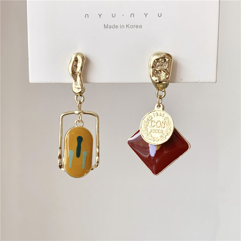 Vintage metal asymmetric earrings