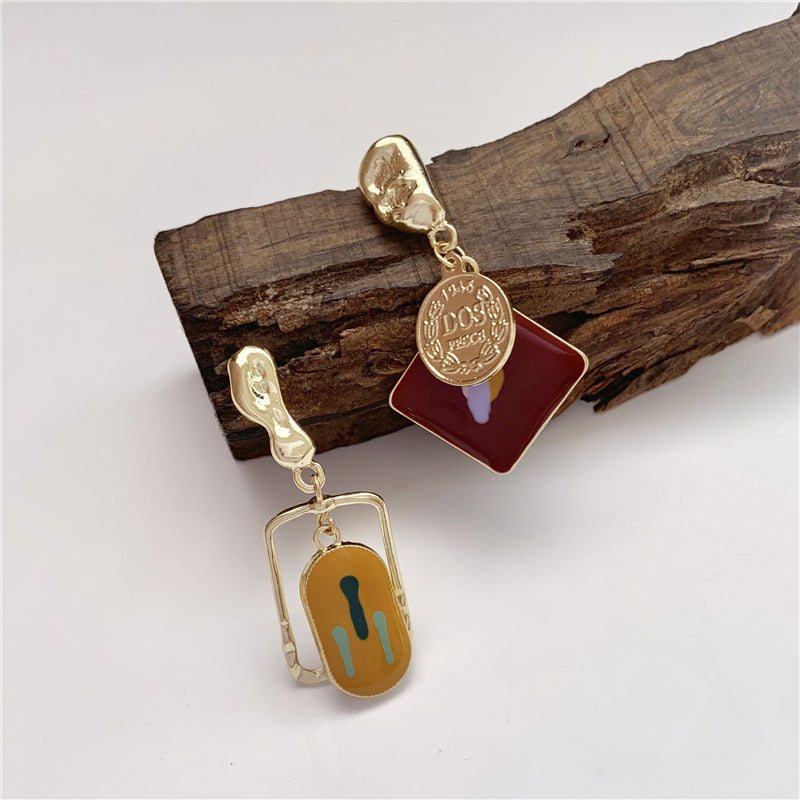 Vintage metal asymmetric earrings