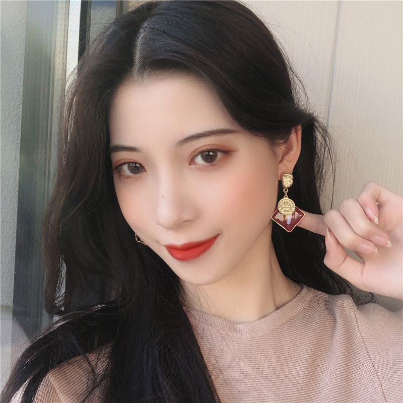 Vintage metal asymmetric earrings