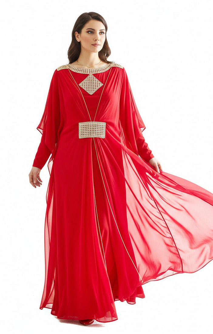 Woman wearing a red evening gown with gold accents on a white background