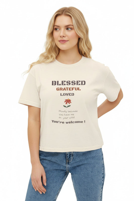 Woman wearing a white t-shirt with a colorful design on a white background