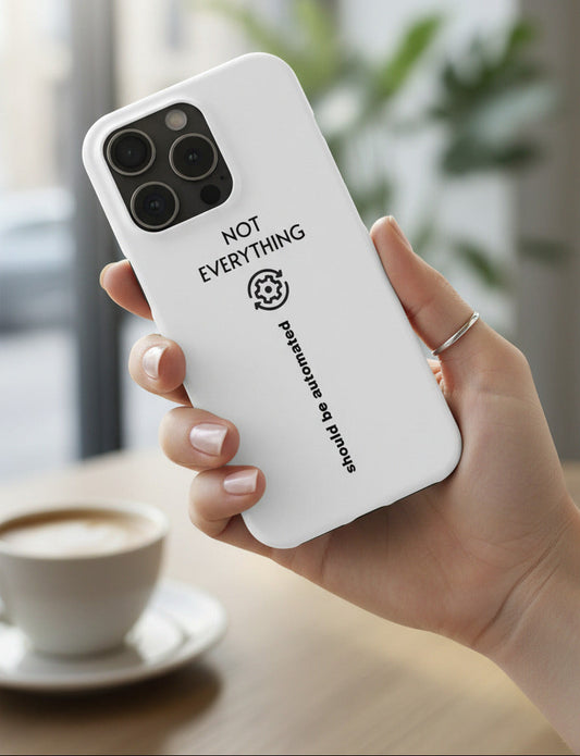 Three Camera white phone case with text 'Not everything should be automated' on a white background--TTP