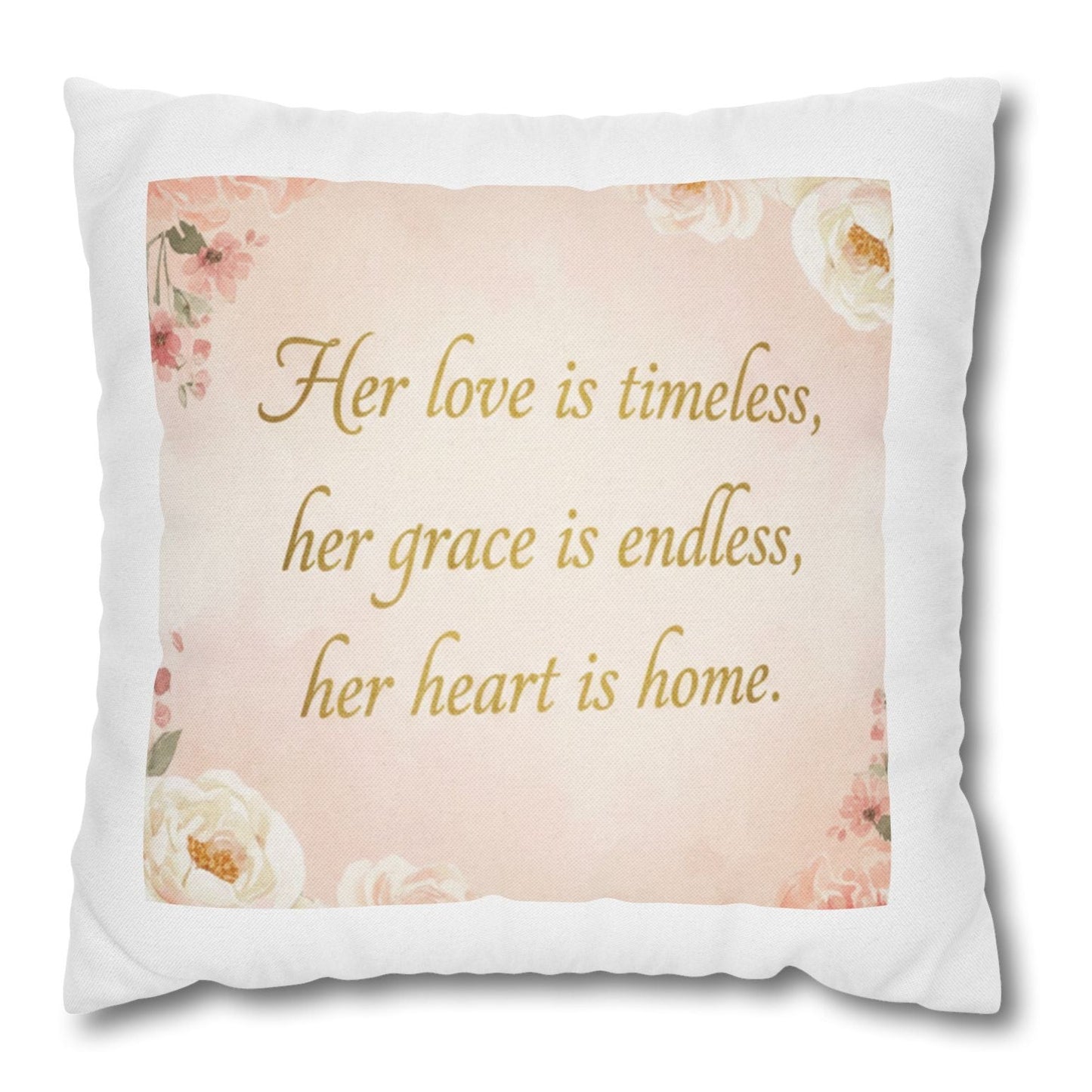 Decorative pillow with floral design and text on a white background