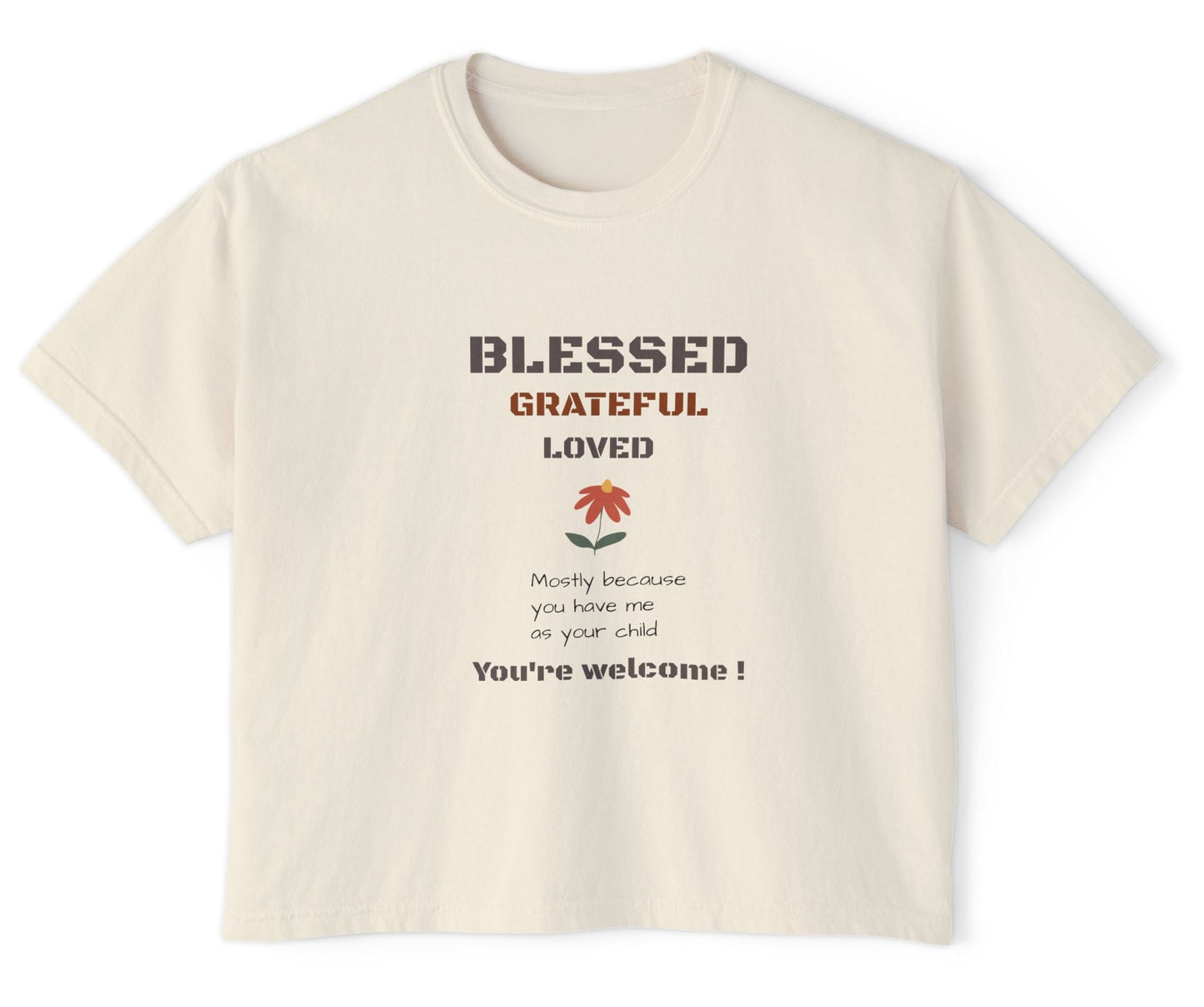 Beige t-shirt with motivational text and a flower graphic on a white background