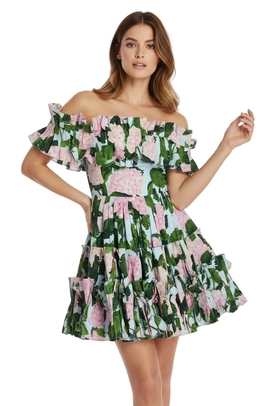 Floral dress with pink flowers and green leaves on a white background