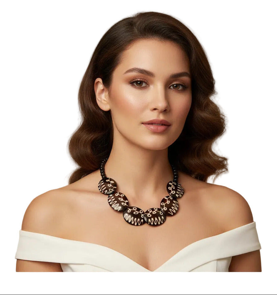 Necklace with tortoiseshell beads on a white background