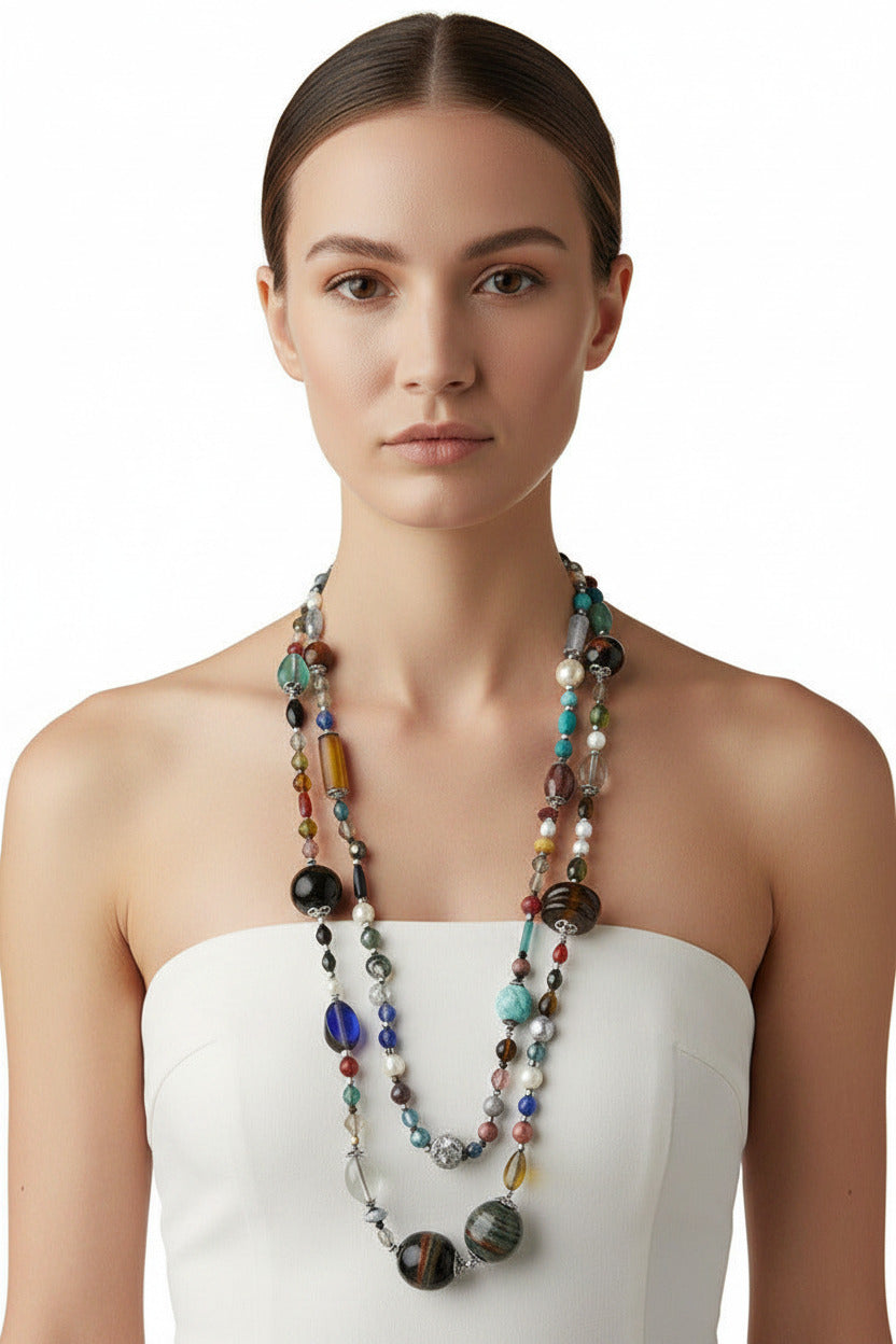 A woman wearing a handcrafted color-rich beaded necklace handmade in the Atlas Mountains of Morocco--TTP