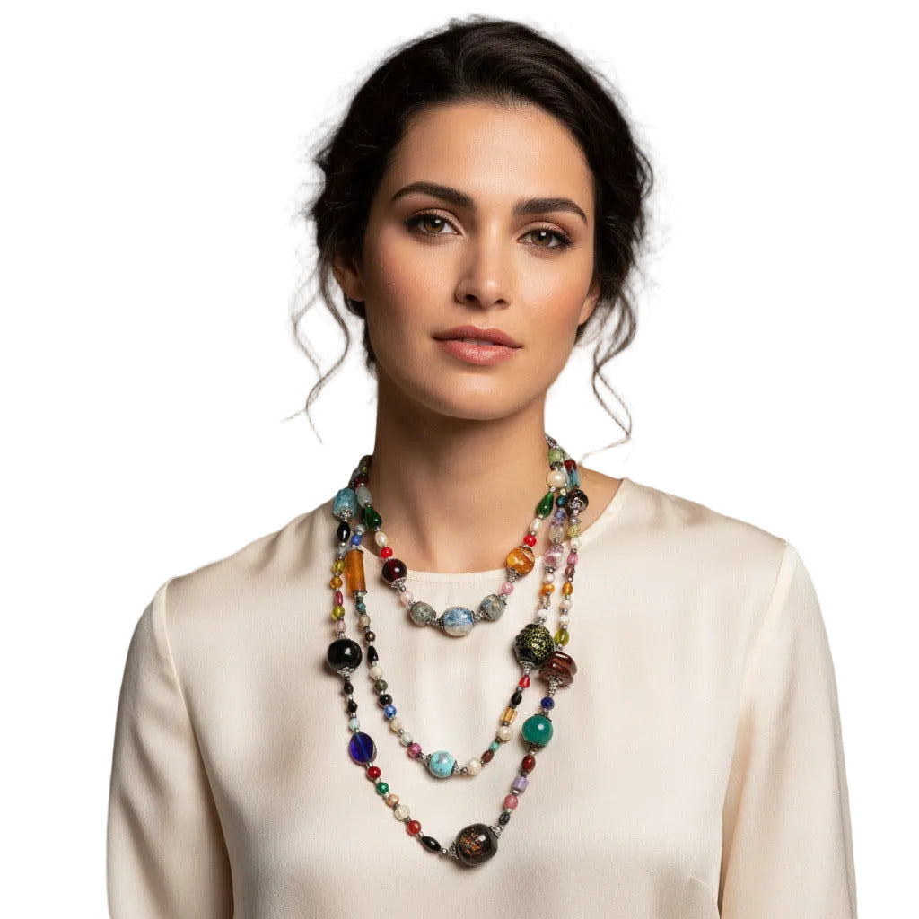  A woman wearing a handcrafted color-rich beaded necklace handmade in the Atlas Mountains of Morocco--TTP
