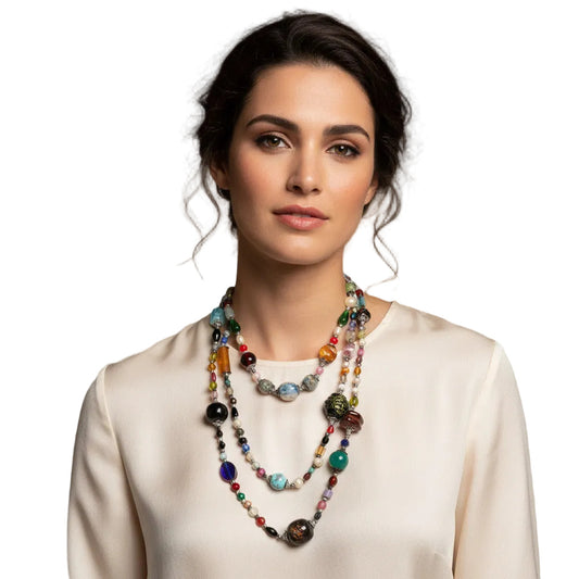  A woman wearing a handcrafted color-rich beaded necklace handmade in the Atlas Mountains of Morocco--TTP