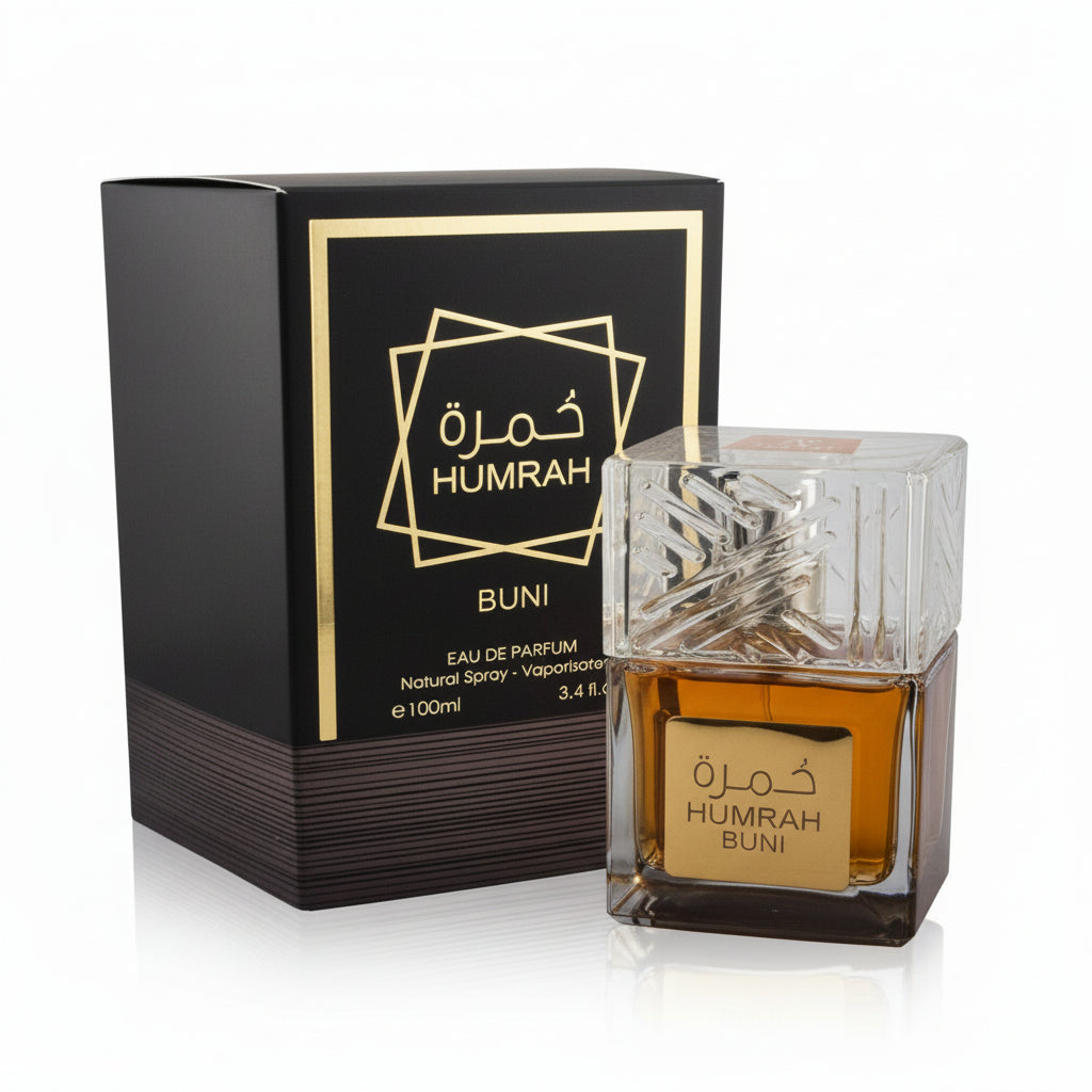 Humrah Buni Eau de Parfum 100ml bottle with sculptural crystal cap and gold label beside its black and gold box — rich Arabian 100ml natural spray men's fragrance displayed against a white background.