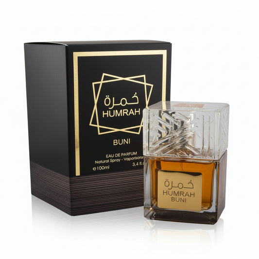 Humrah Buni Eau de Parfum 100ml bottle with sculptural crystal cap and gold label beside its black and gold box — rich Arabian 100ml natural spray men's fragrance displayed against a white background.