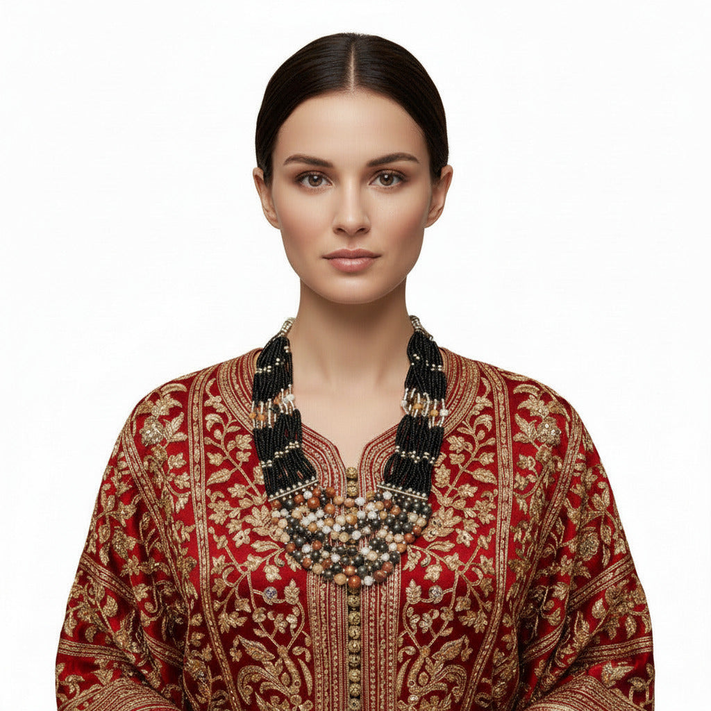 Woman wearing a lava rock stone Berber-style necklace with amber resin beads--TTP 