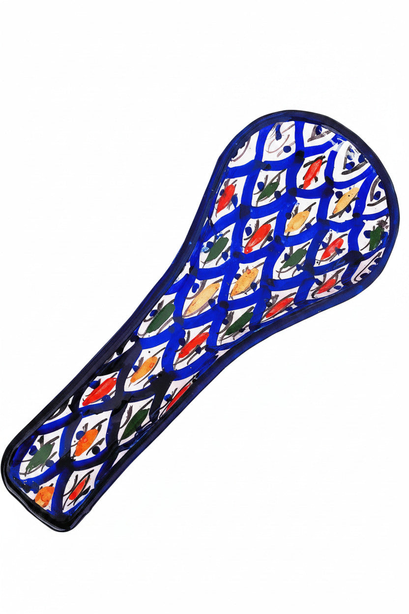 A blue and white patterned saddle pad with a repeating design of colorful fish on a diamond grid, shown on a plain white background.
