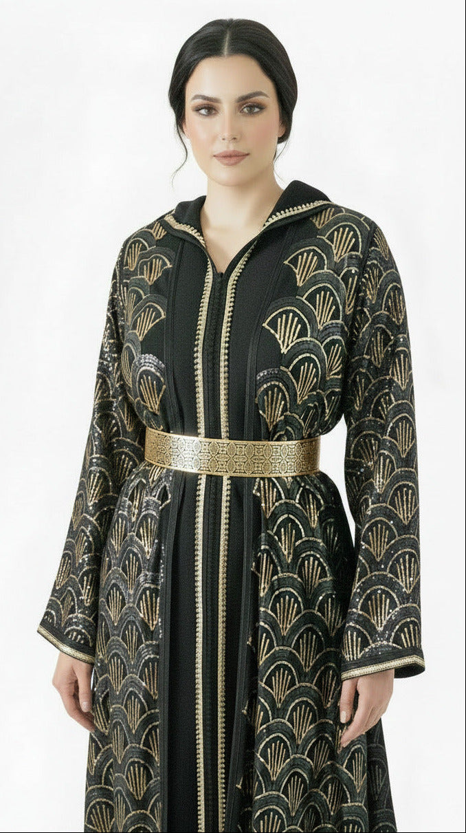Woman wearing a black and gold patterned jacket on a white background