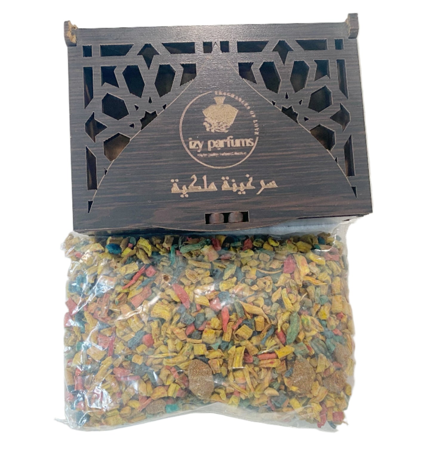 A wooden incense box with geometric cutouts and Arabic calligraphy, shown above a clear plastic bag filled with colorful dried Royal Serghina incense. T