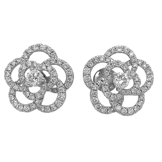 Pair of silver floral earrings on a white background