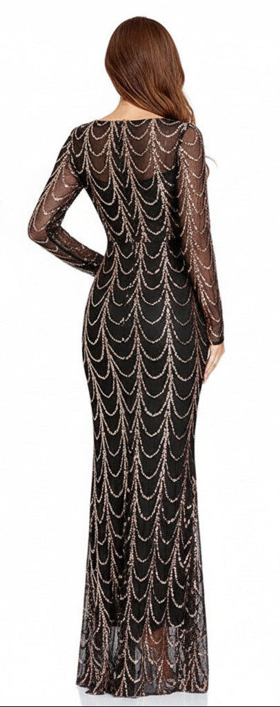 Black evening gown with gold embellishments on a white background