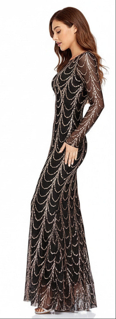 Black evening gown with gold embellishments on a white background