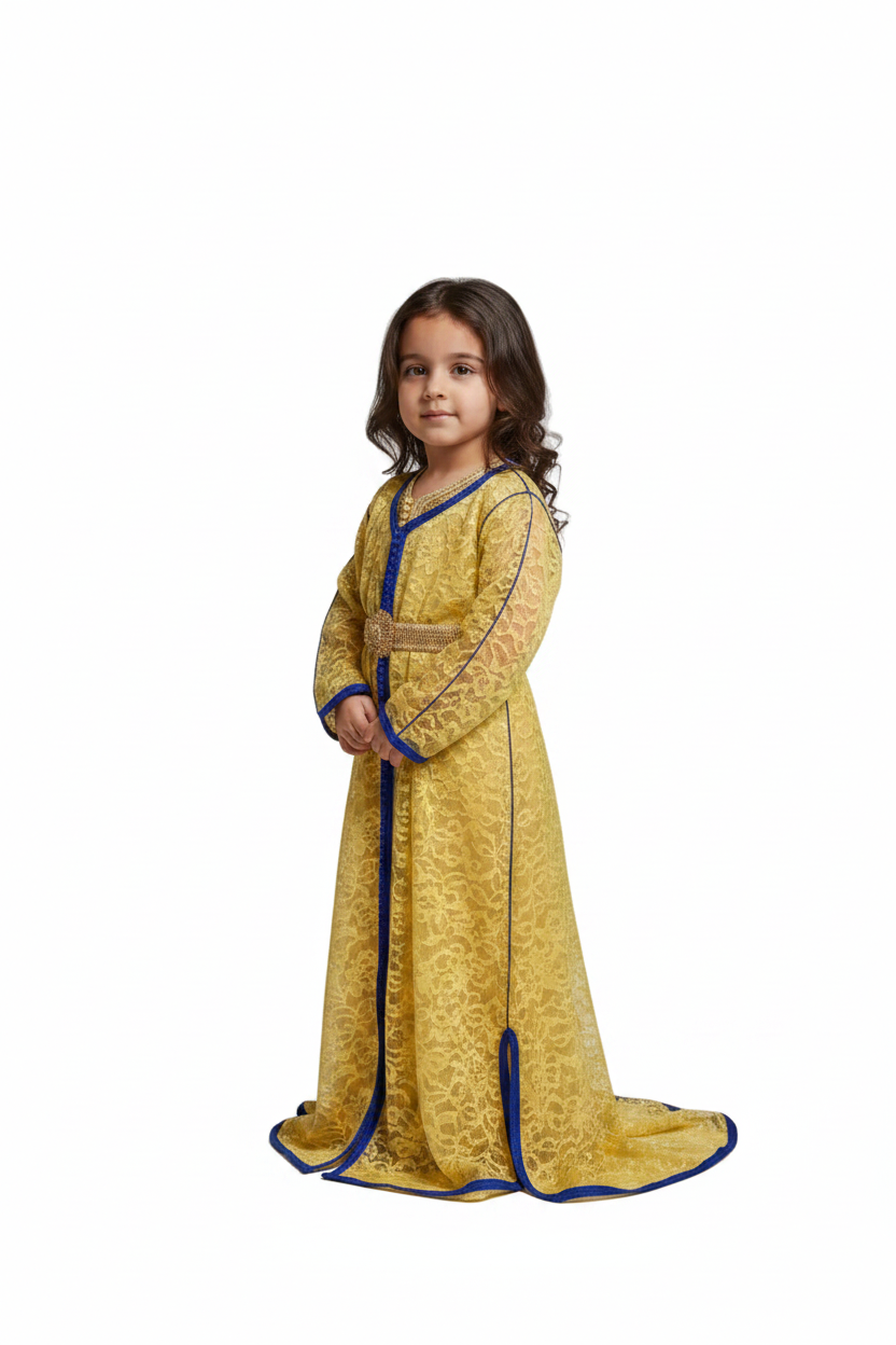 Child wearing a yellow and blue traditional outfit on a plain background